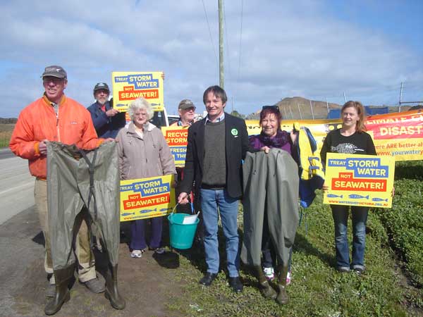 Watershed Victoria Members offering Premier Brumby Gum Boots for his recent visit to the Wonthaggi desalination site.